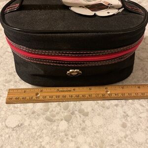 NWT cute Modella Signature Basics zip-around cosmetic train bag.